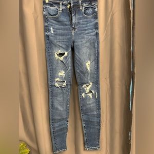 High waisted ripped jeans